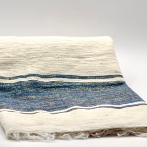 Yabsra Scarf in Azure — handwoven Ethiopian cotton scarf featuring soft cream tones with blue and teal woven stripes.