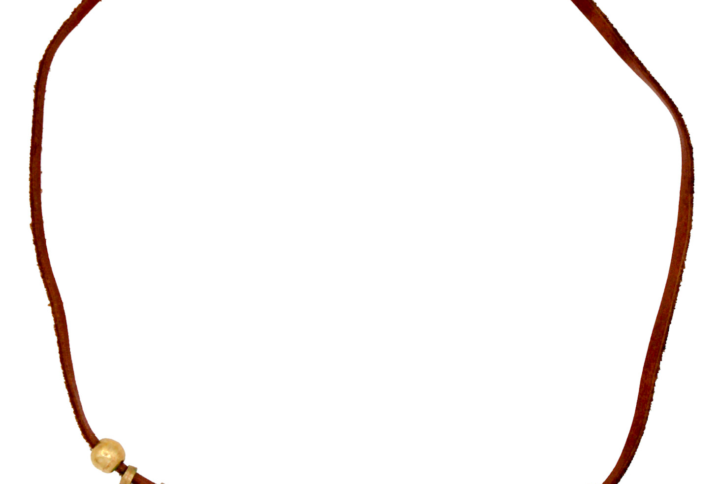 Single-strand gold necklace with hand-cut metal amulets and a medium brown leather strap, crafted by artisans in Ethiopia.